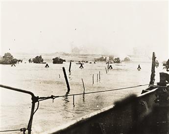 (WWII) A selection of 5 photographs documenting the Allied D-Day landing and its aftermath.